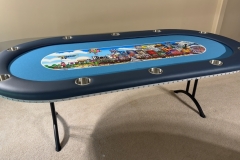 Atlantic City poker table with the atlantic city shyline printed on the table.
