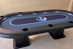 Custom Star Wars theme poker table. Star Wars logos on the playing surface. Blue color with led lights.