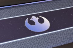 Custom poker table gaming cloth featuring a Star Wars theme, Star Wars fighter planes and a large star wars logo in the center.