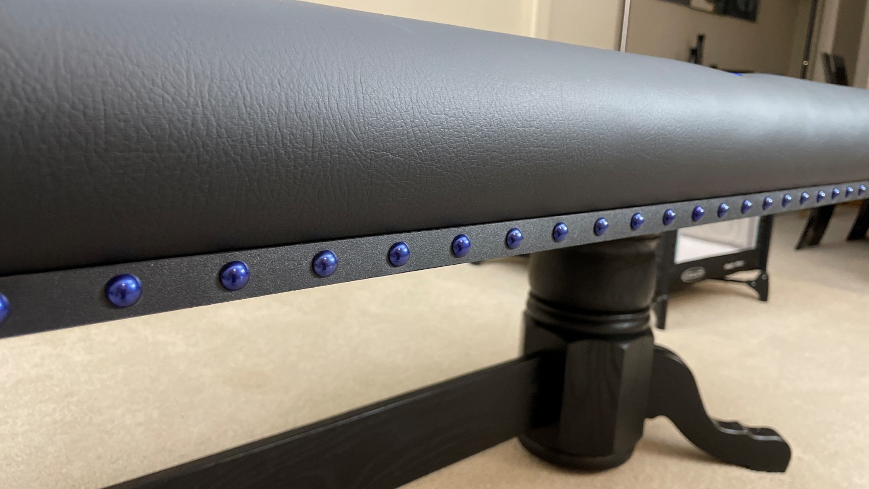 Blue Nail Heads poker table with black edge banding & blue decorative nail heads