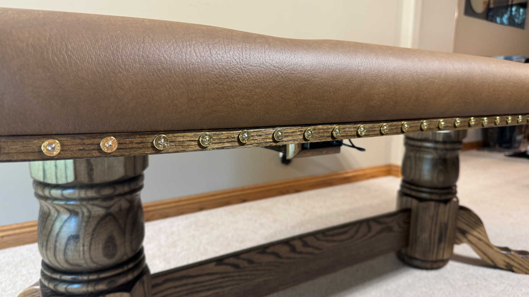 Deco Bullet Heads poker table with Oak edge banding and bullet slices