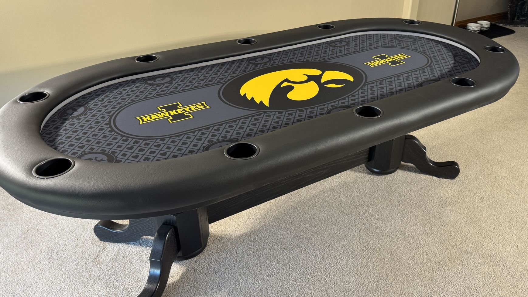 Iowa Hawkeyes poker table black and yellow poker table with Iowa Hawkeye logos