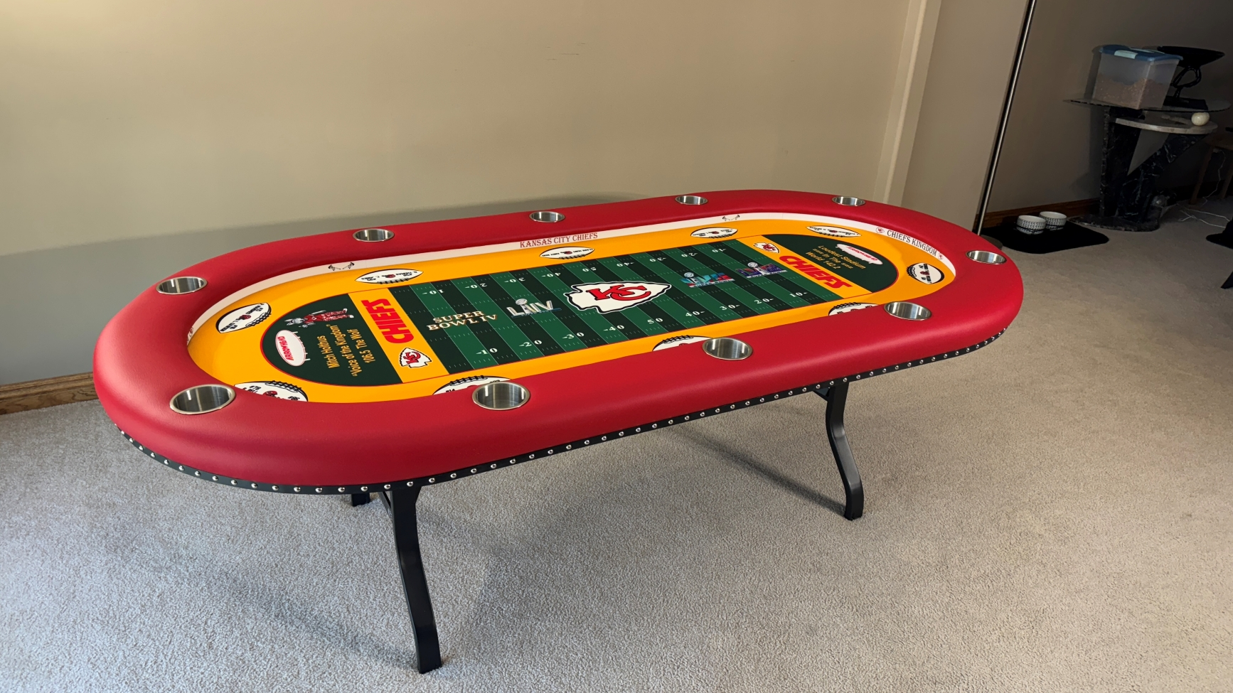 Kansas City Chiefs poker table Red Kansas City Chiefs poker table with football field printed on the playing surface