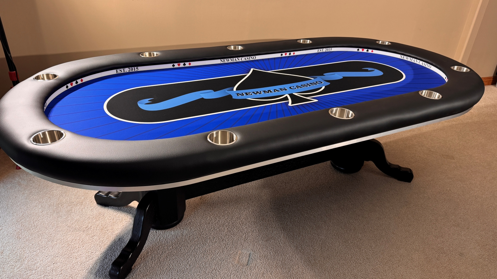 Newman Casino custom poker table blue silver and black custom poker table