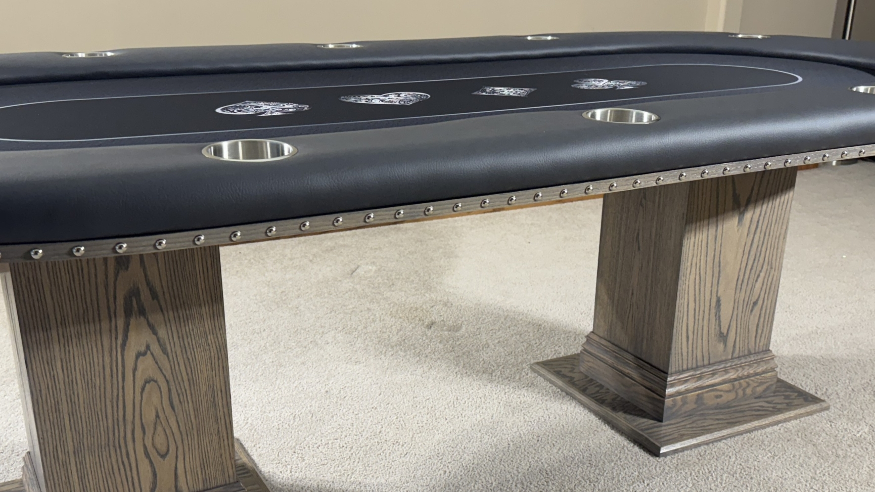 Oak and Polished Deco Nail Heads poker table with Oak edge banding and polished deco nail heads