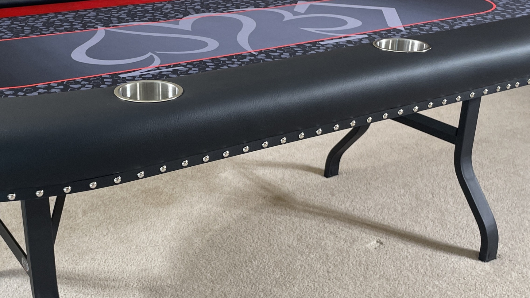 Polished Deco Nail Heads poker table with black edge banding and polished deco nail heads