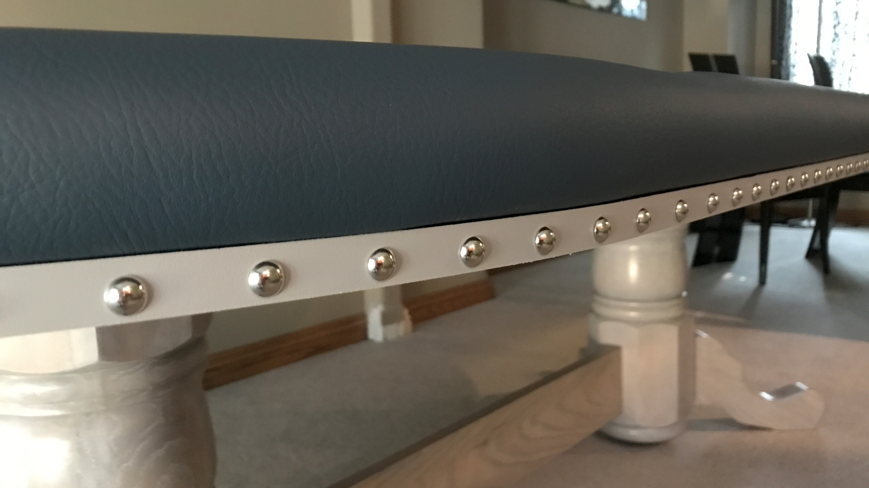 Polished Nail Heads poker table with grey edge banding and polished deco nail heads